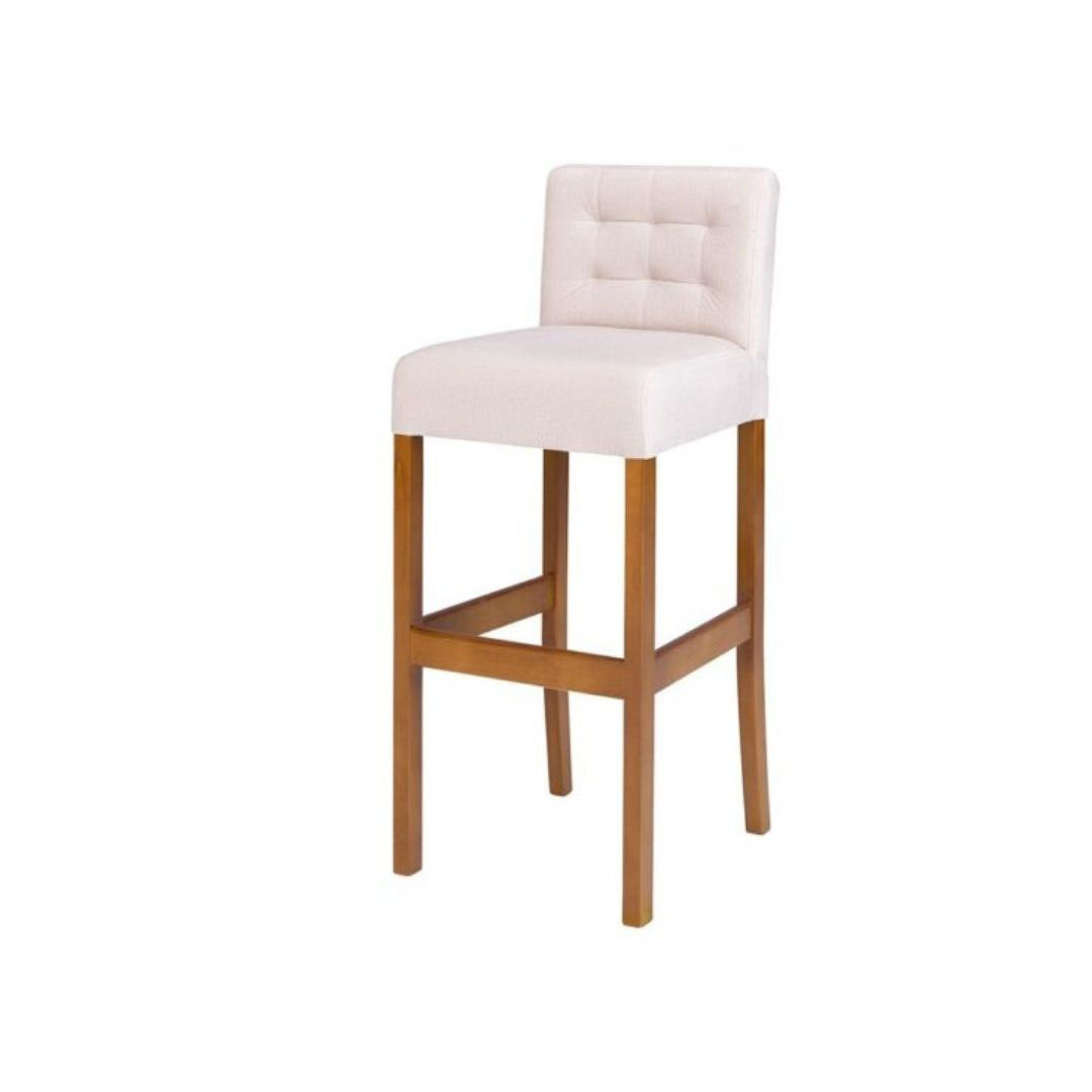 white accent chair with wooden legs